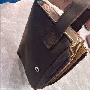 Bvulgari Elegant Brown Handbag for colognes or personal items unisex